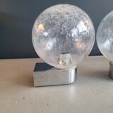 Pair of vintage wall lights in chrome metal with bubbled glass globes.