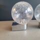 Pair of vintage wall lights in chrome metal with bubbled glass globes.
