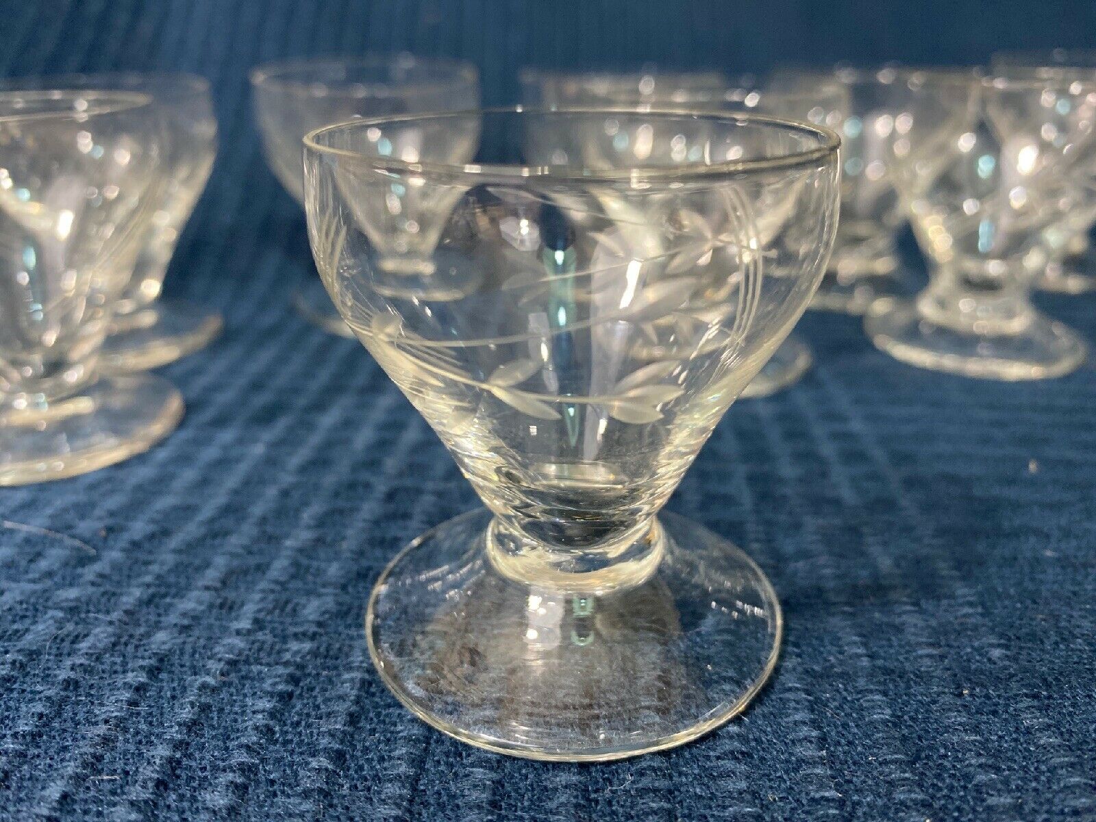 Set of 12 hand-sized crystal glasses with flower decoration
