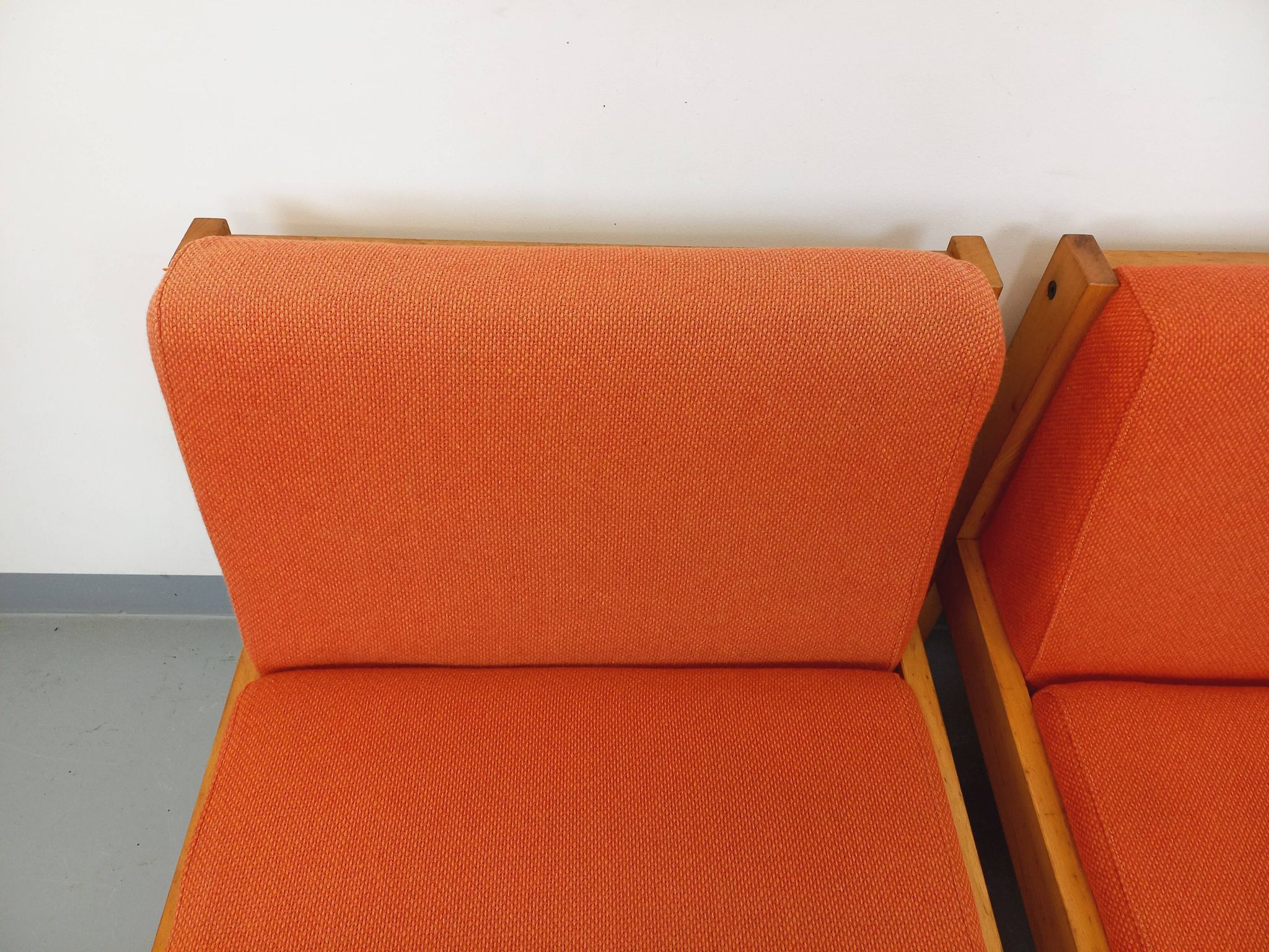 Set of 2 vintage Baumann armchairs in orange fabric and wood from the 80s