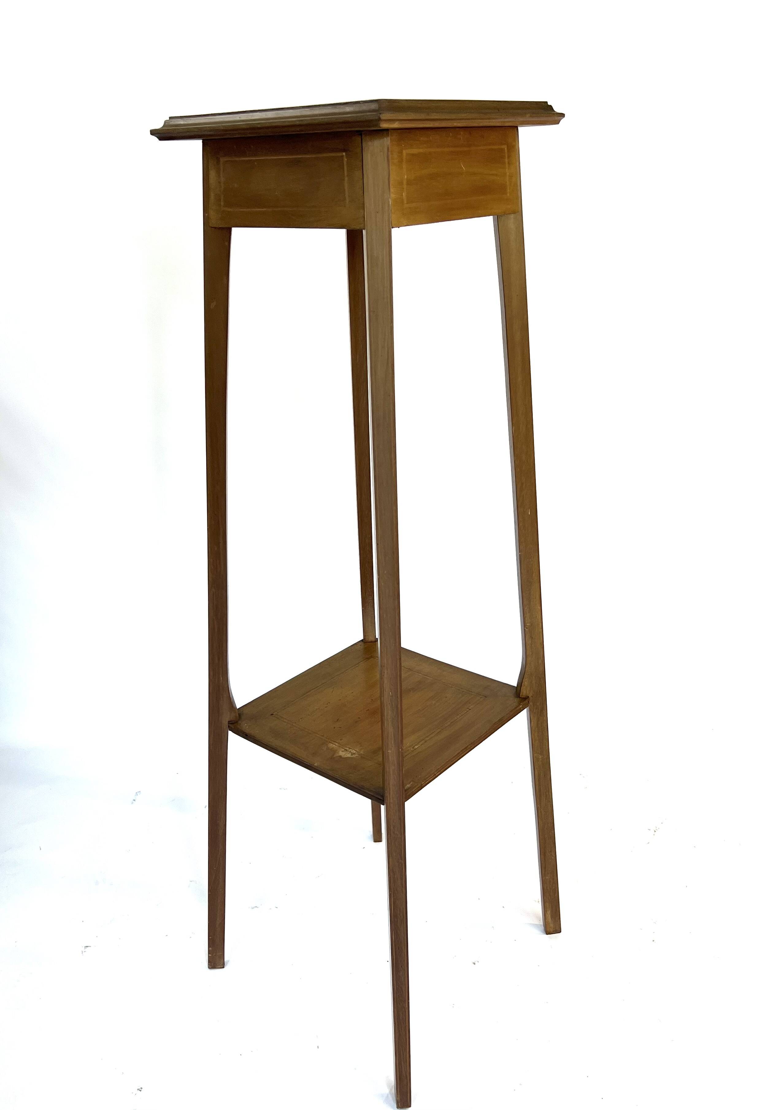 Large wooden pedestal table