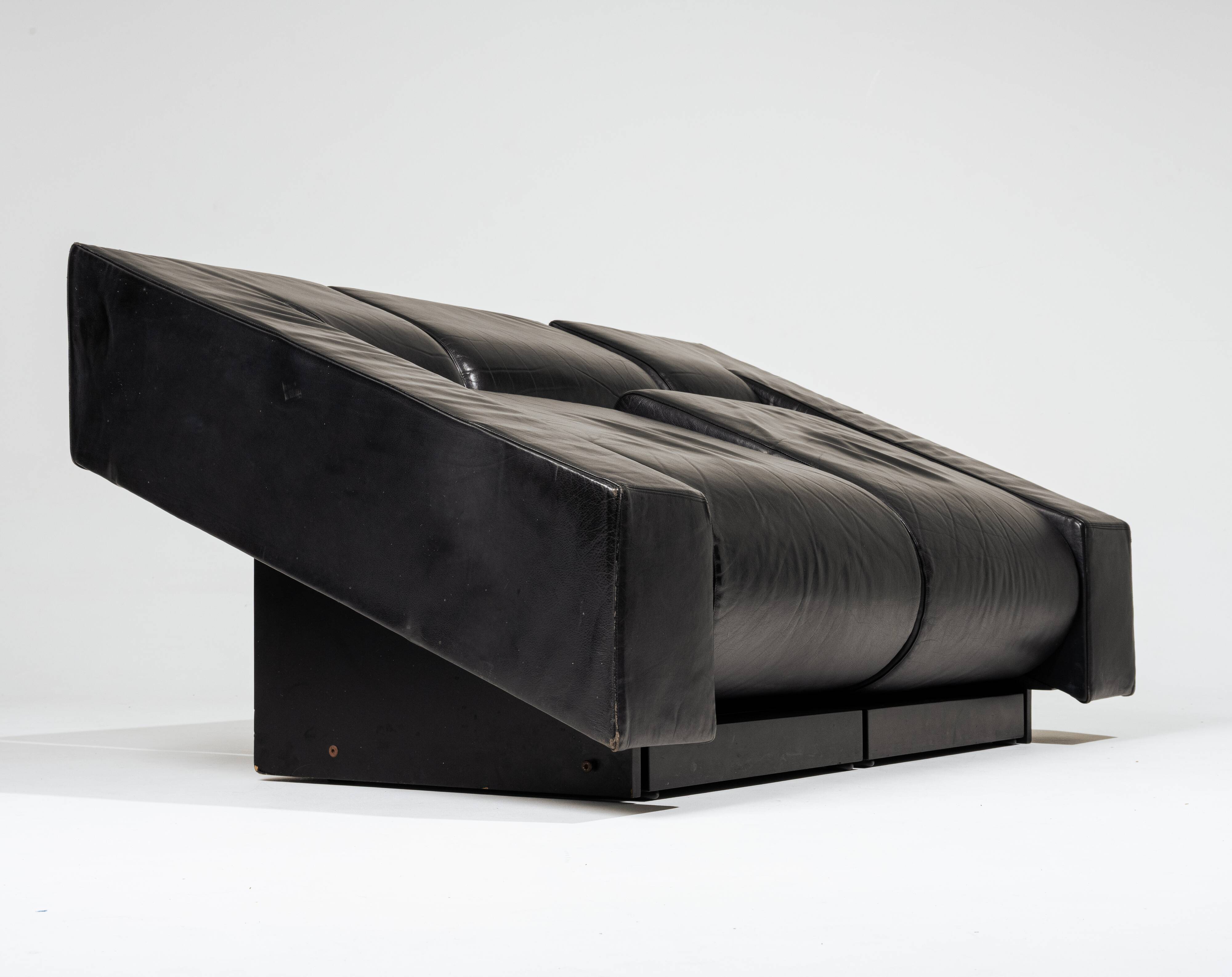 Obliqua two-seater leather sofa, Mario Botta, 1980s