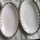 2 porcelain dishes with lions in the French Art Deco style