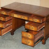 Partner desk Bevan Funnell in hardwood with leather top and gold leaf gilding.