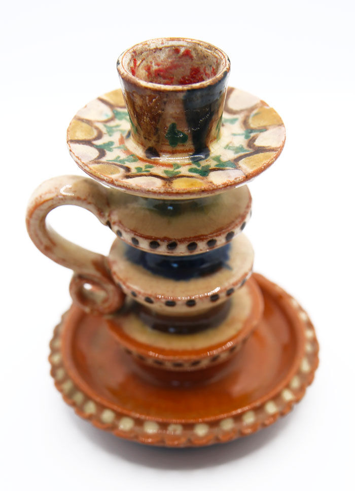Ancient candlestick of Chmielno pottery, Poland