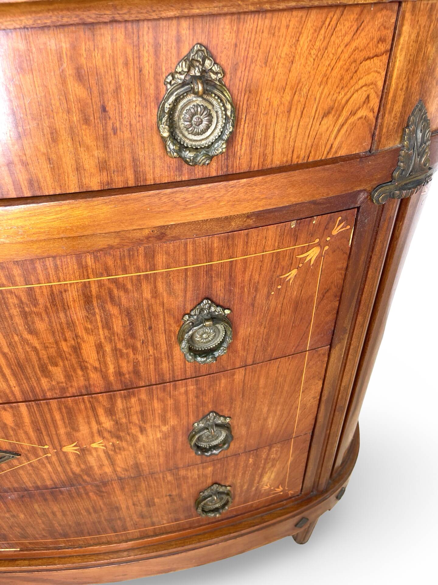 The demi-lune commode/ chest of drawers