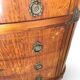 The demi-lune commode/ chest of drawers
