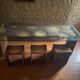 Dining table and 3 Ripples stools by Toyo Ito.