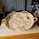 Braided basket in natural fiber, free form, vintage