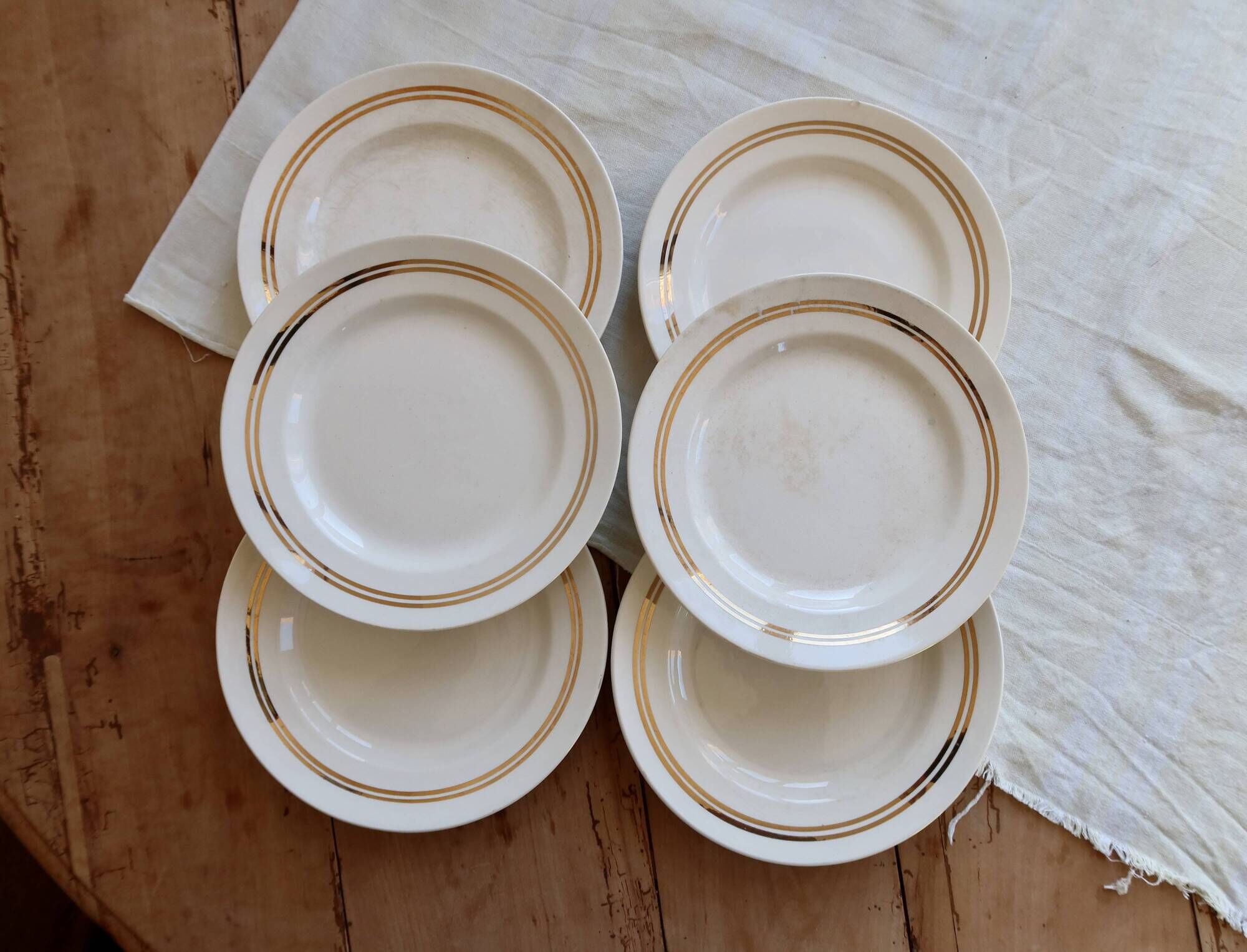 6 plates vintage ivory faience with gold trim