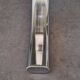 Round table in chromed metal and smoked glass