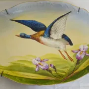Antique decorative plate in porcelain – flying duck design