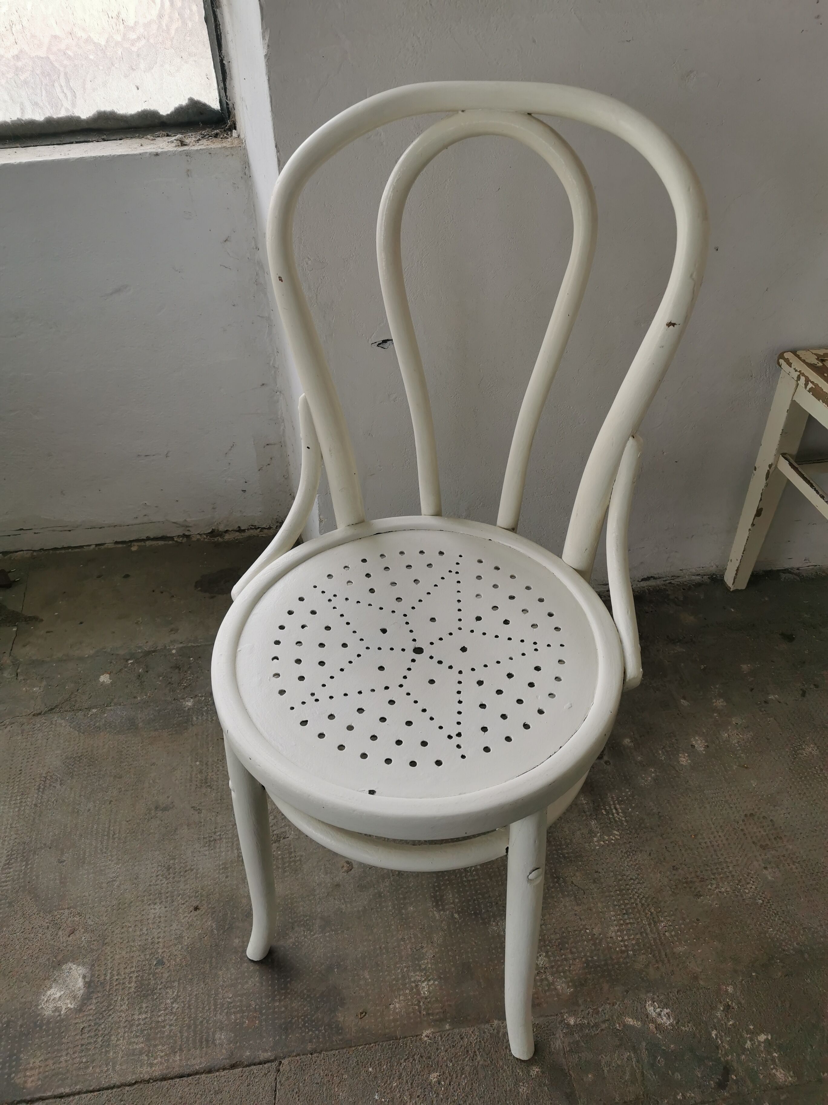 Set of 6 mismatched white chairs