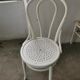 Set of 6 mismatched white chairs