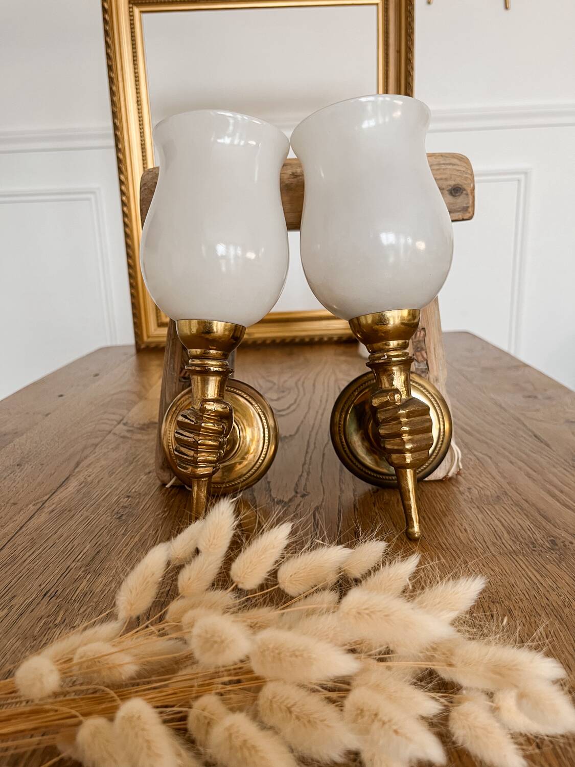 Set of 2 golden, bronze and brass torch wall lights