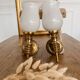 Set of 2 golden, bronze and brass torch wall lights