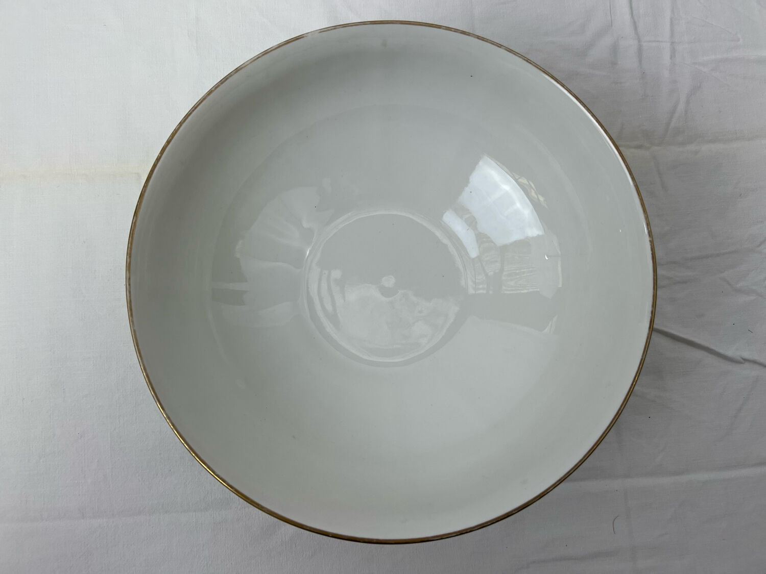White and golden salad bowl