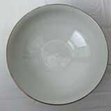 White and golden salad bowl