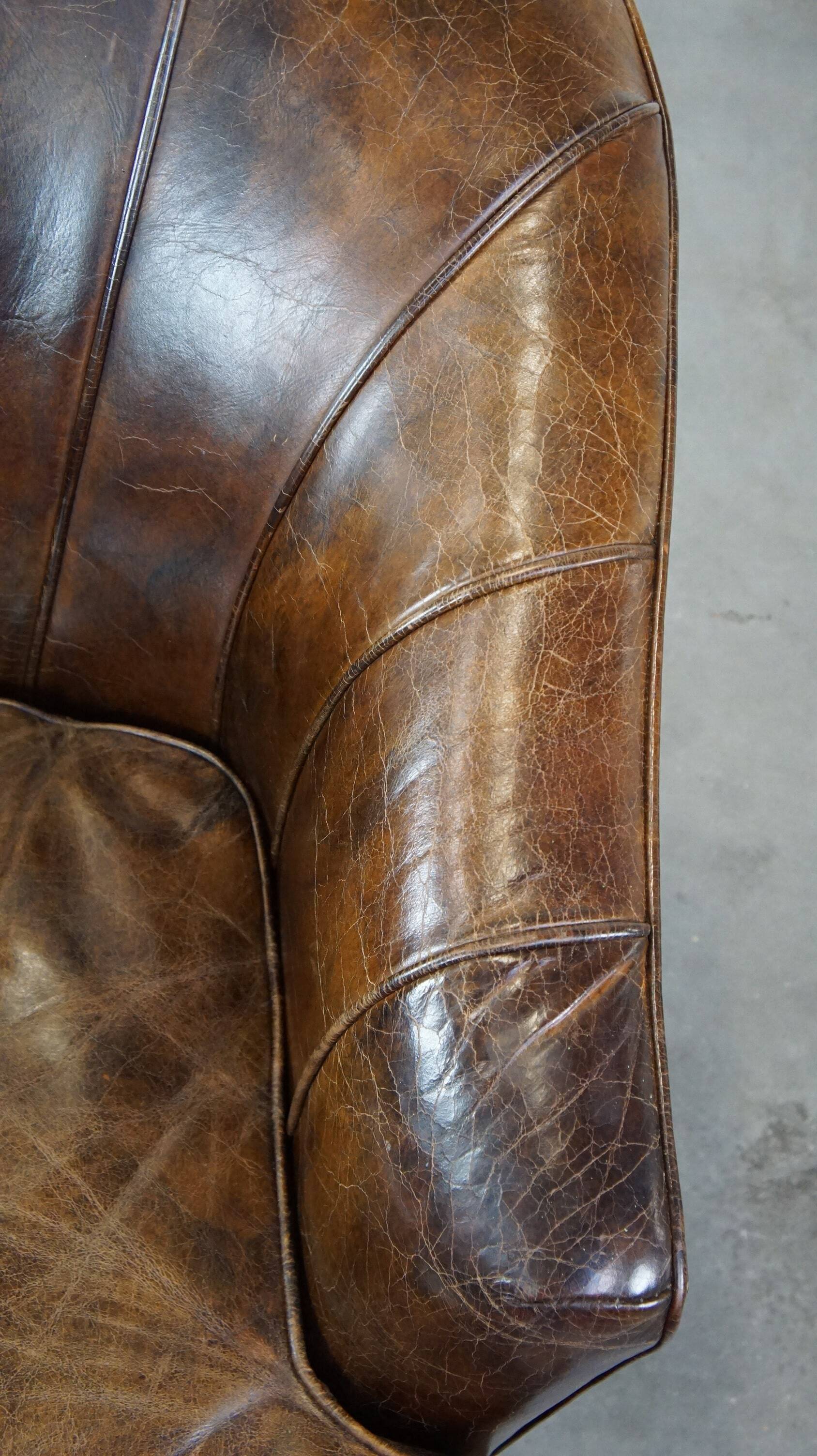 Stylish armchair with a unique design and beautiful finish, made of leather