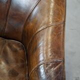 Stylish armchair with a unique design and beautiful finish, made of leather