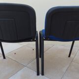 2 stackable chairs of black and blue fabrics