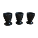 Trio of black marble cockroaches