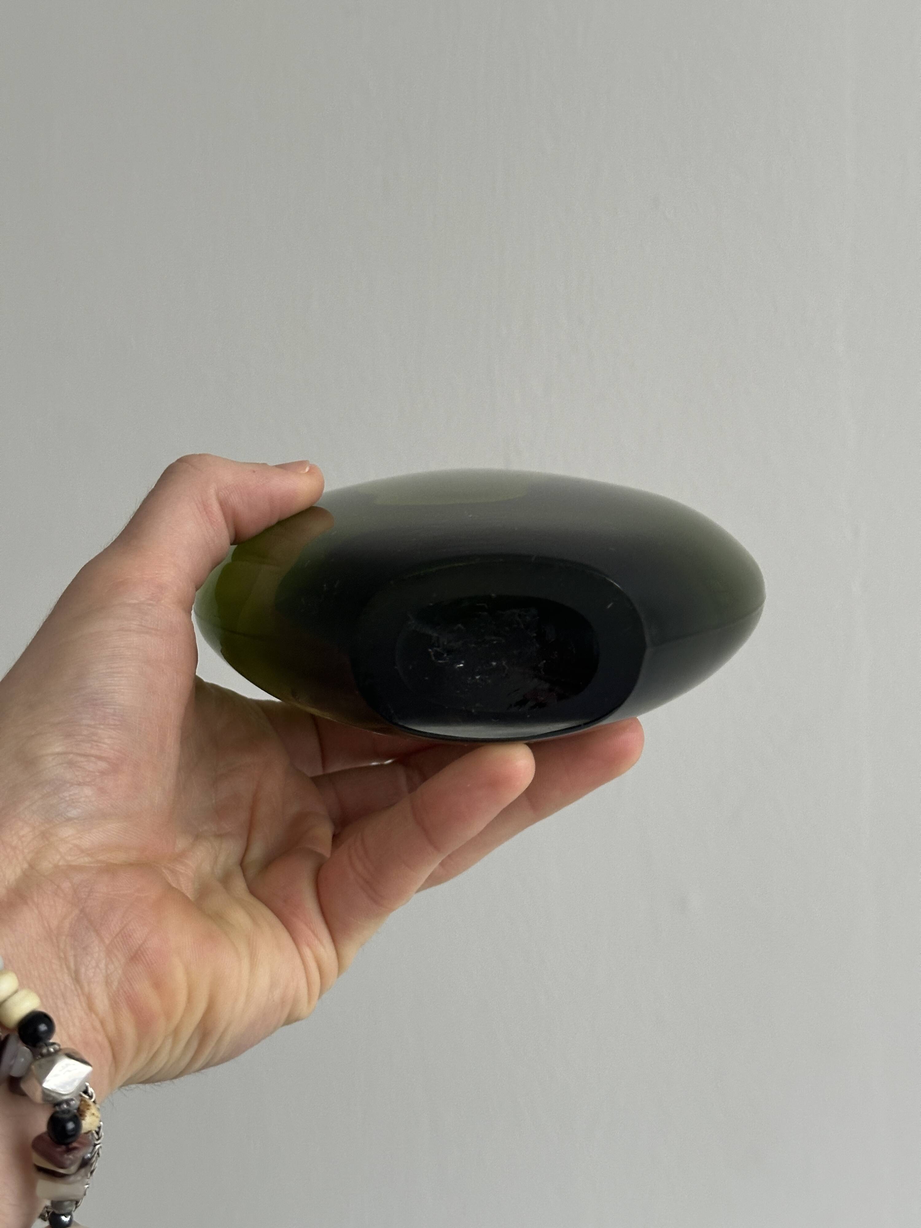 Blown green glass vase