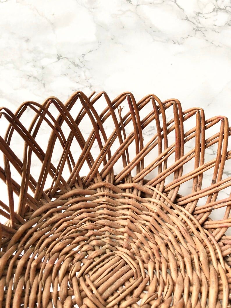 Old French toast or fruit basket in braided wicker
