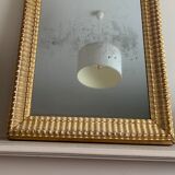 Carved and gilded wooden mirror  44x56cm
