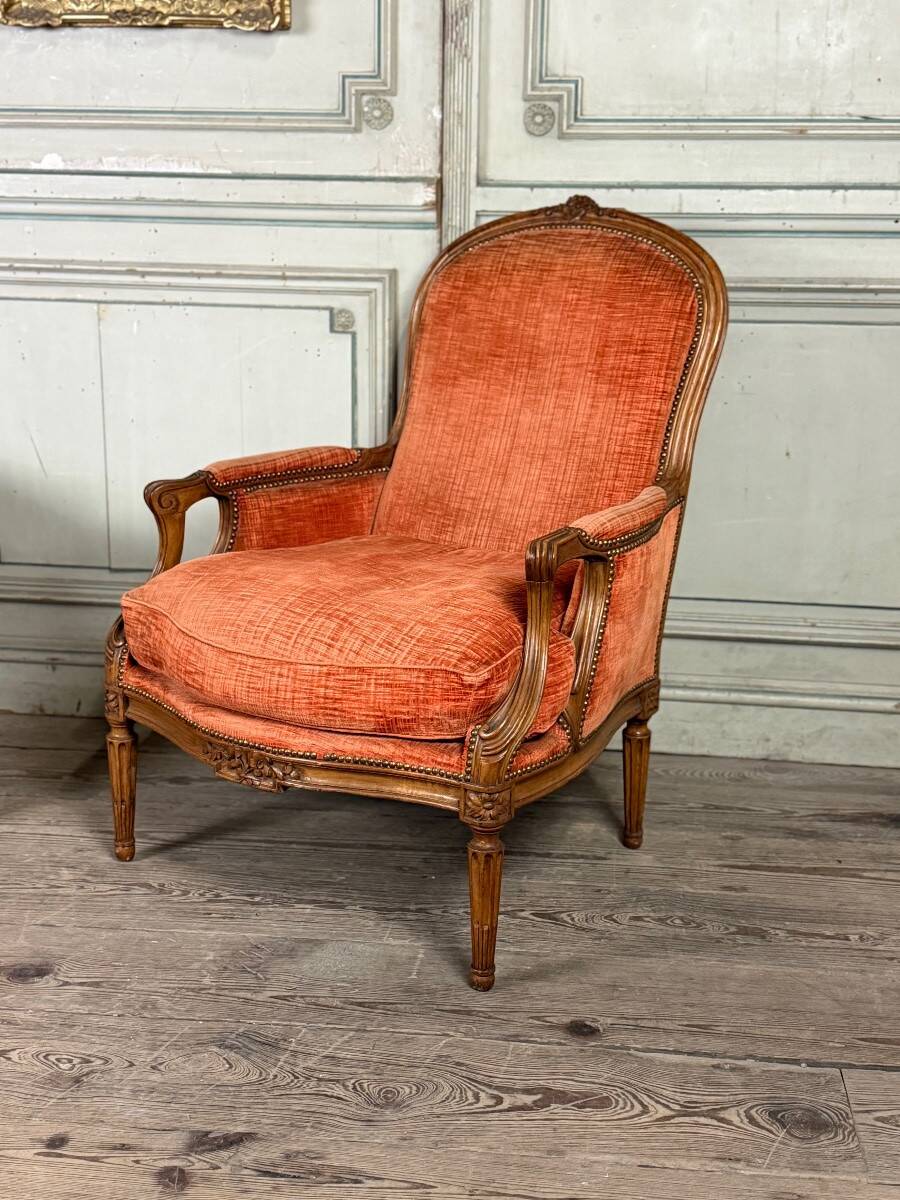 Pair of transitional carved wooden armchairs, 18th century