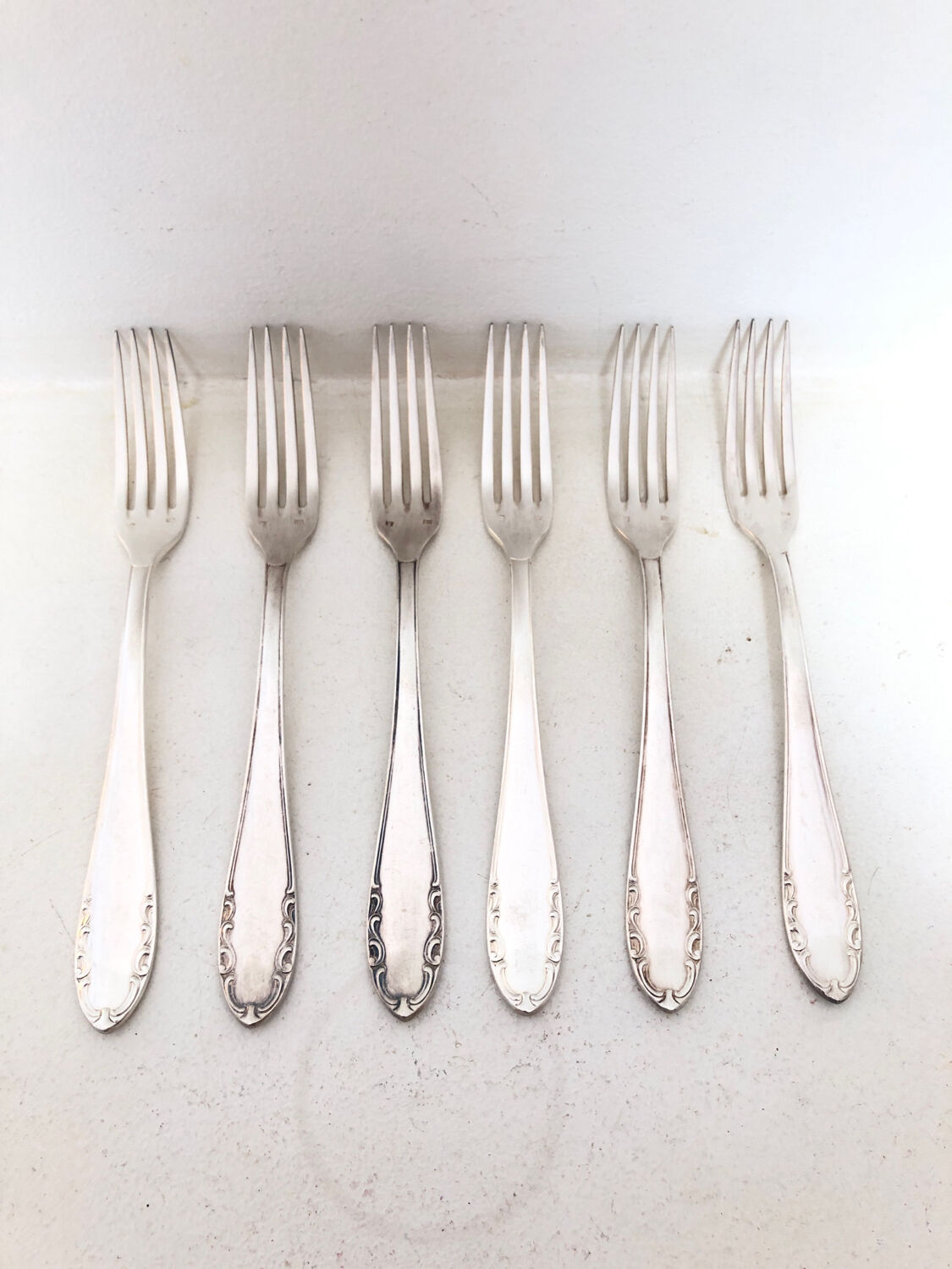 6 silver metal forks, 1930