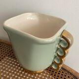 Two green and gold vases with handles