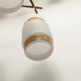 Scandinavian triangle pendant light in cascade with 3 opalines