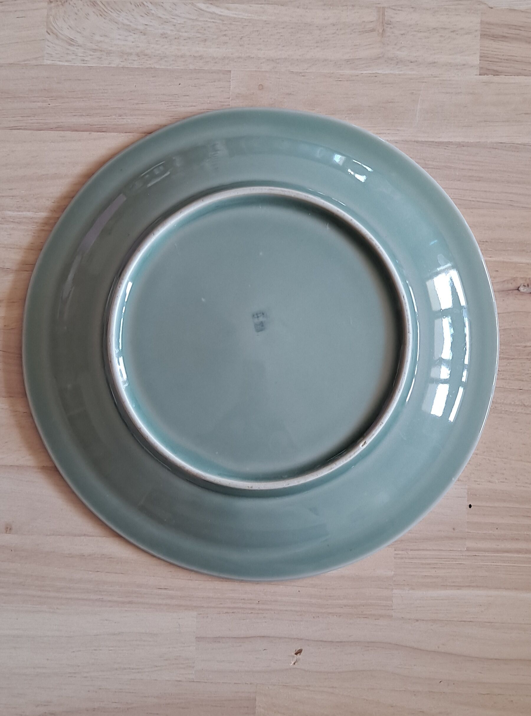Celadon green plate with fish