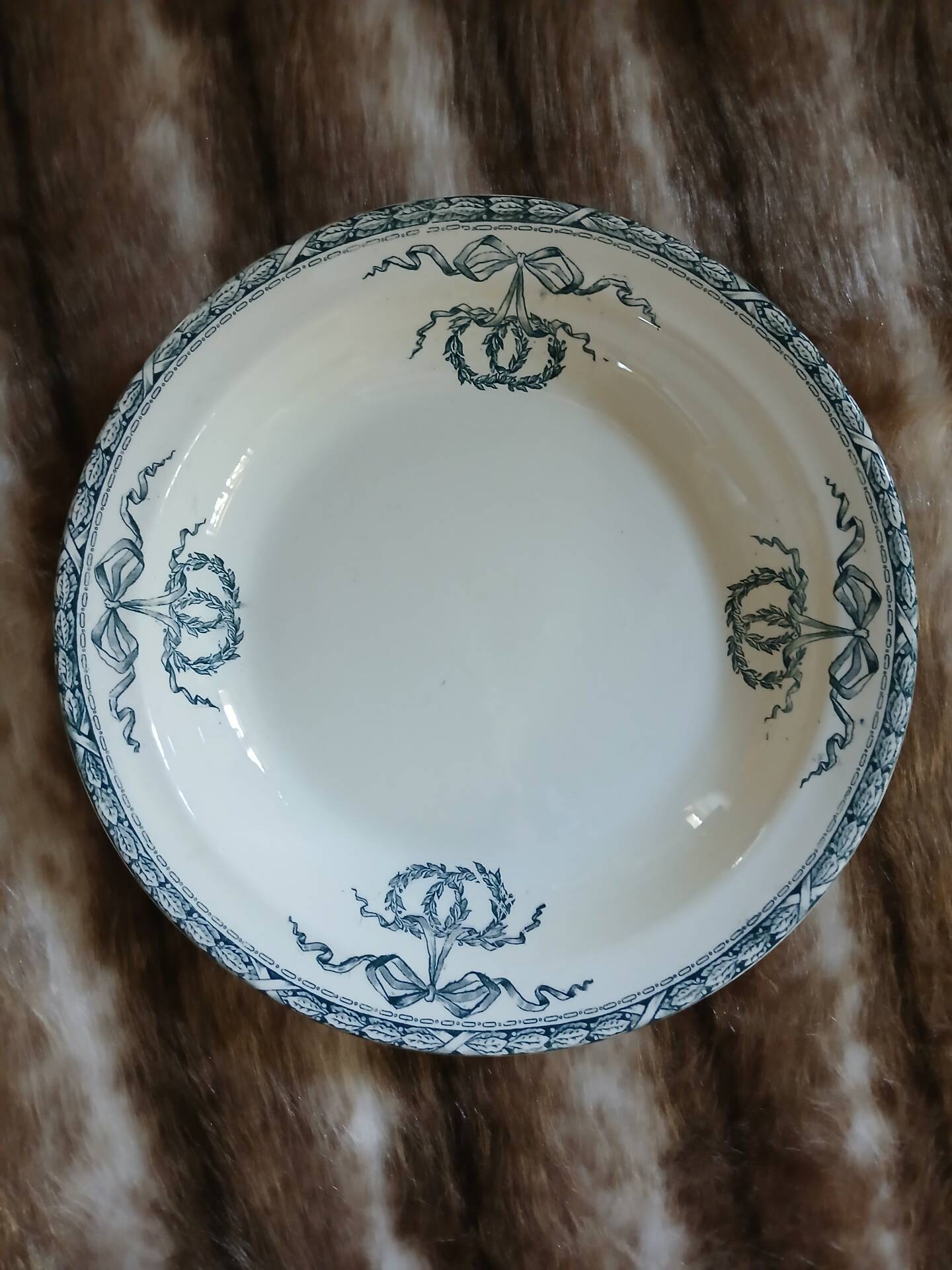Old hollow dish made of Salins ironstone.