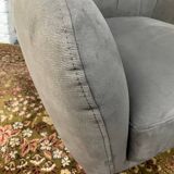 Swivel armchair in velvet fabric and metal