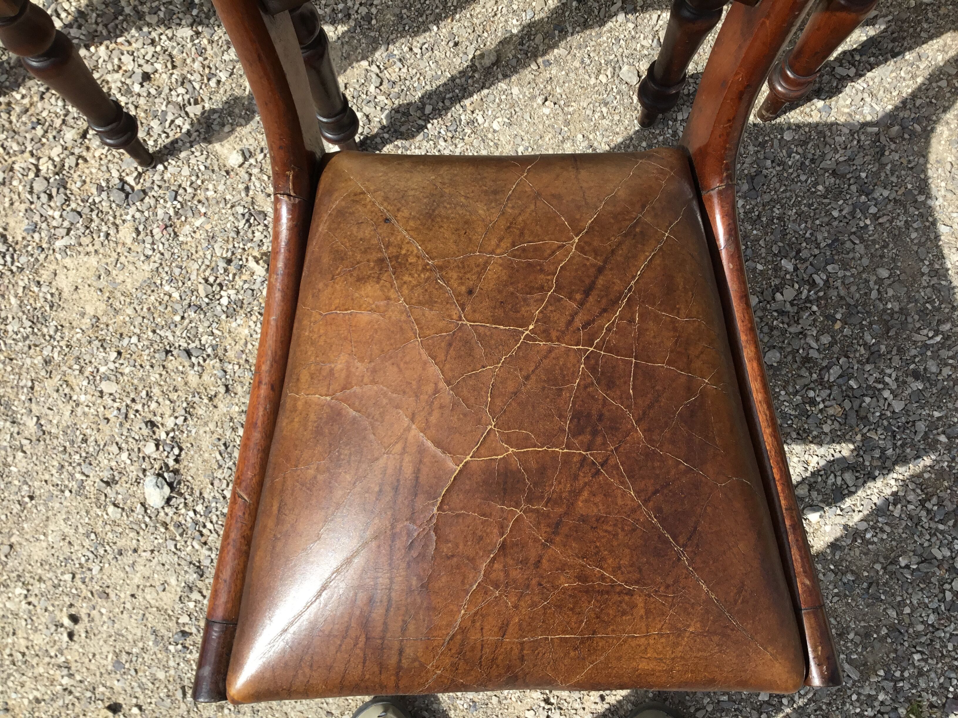 A series of 4 mahogany chairs with 19th th eme leather patties in good condition