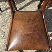 A series of 4 mahogany chairs with 19th th eme leather patties in good condition
