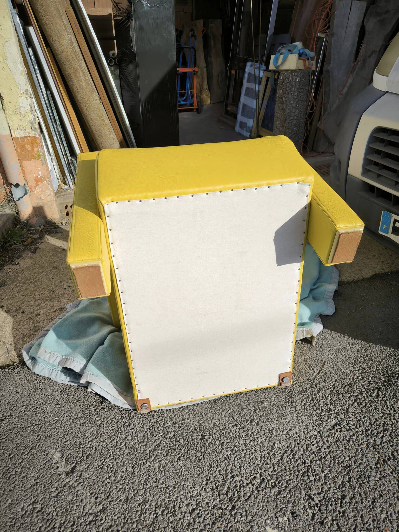 Pair of armchairs in sunny yellow leather