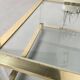 Table basse lucite, laiton et verre années 70