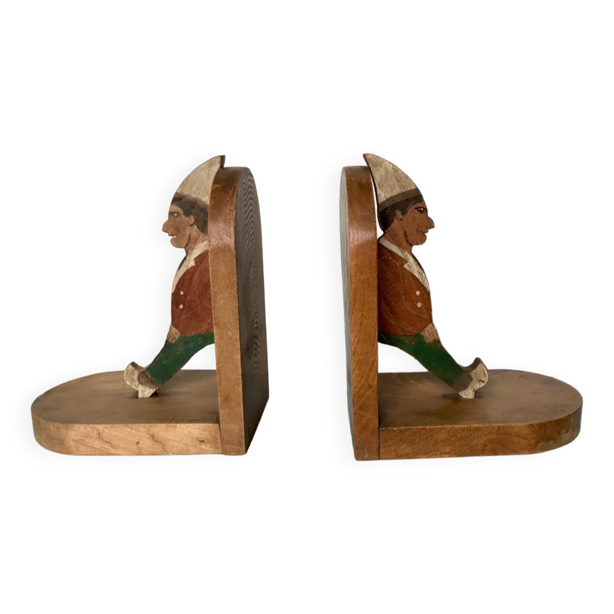 Old wooden bookends with painted characters