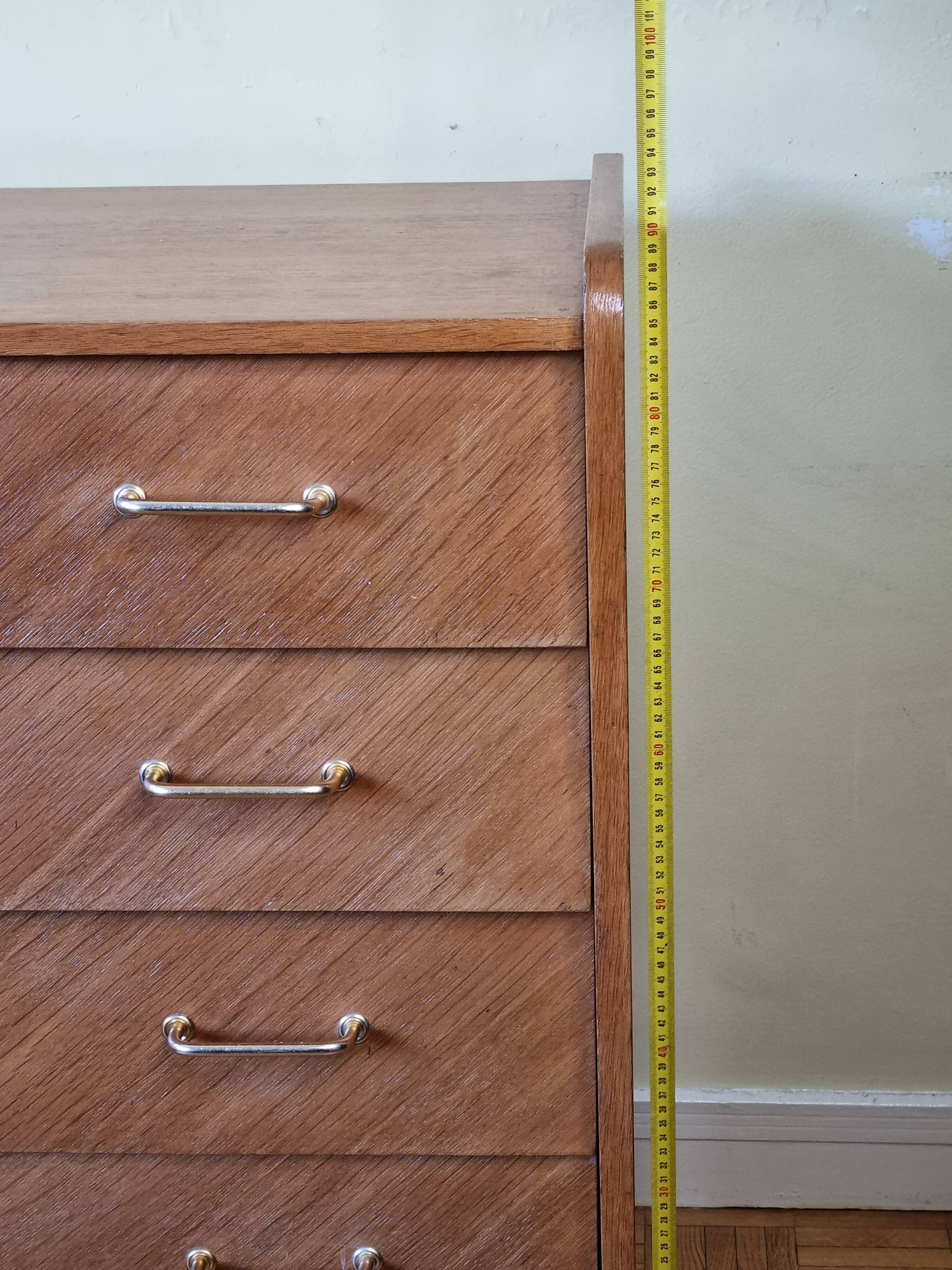 Vintage chest of drawers in modernist veneered wood from the 50s