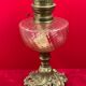 Lampe à pétrole réservoir verre cathédrale pied bronze louis xv rocaille 54 cm