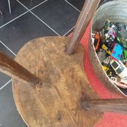 Old wooden tripod stool