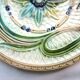 Art Deco dabbling plate, muscaris and a butterfly.