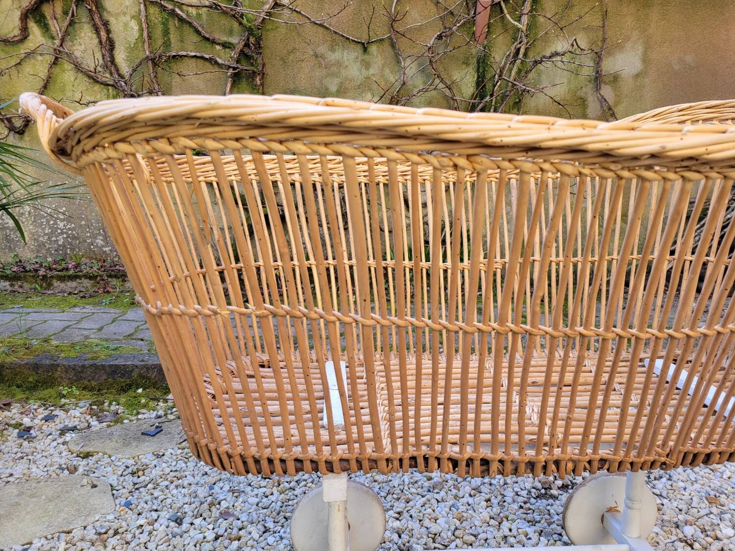 Wicker cradle on wheels, late 19th century