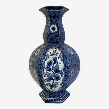 Vase faïence motifs floraux bleu et blanc