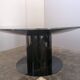 Black lacquered glass table and glass in the hoof style, Italy.