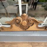 Carved wooden pediment