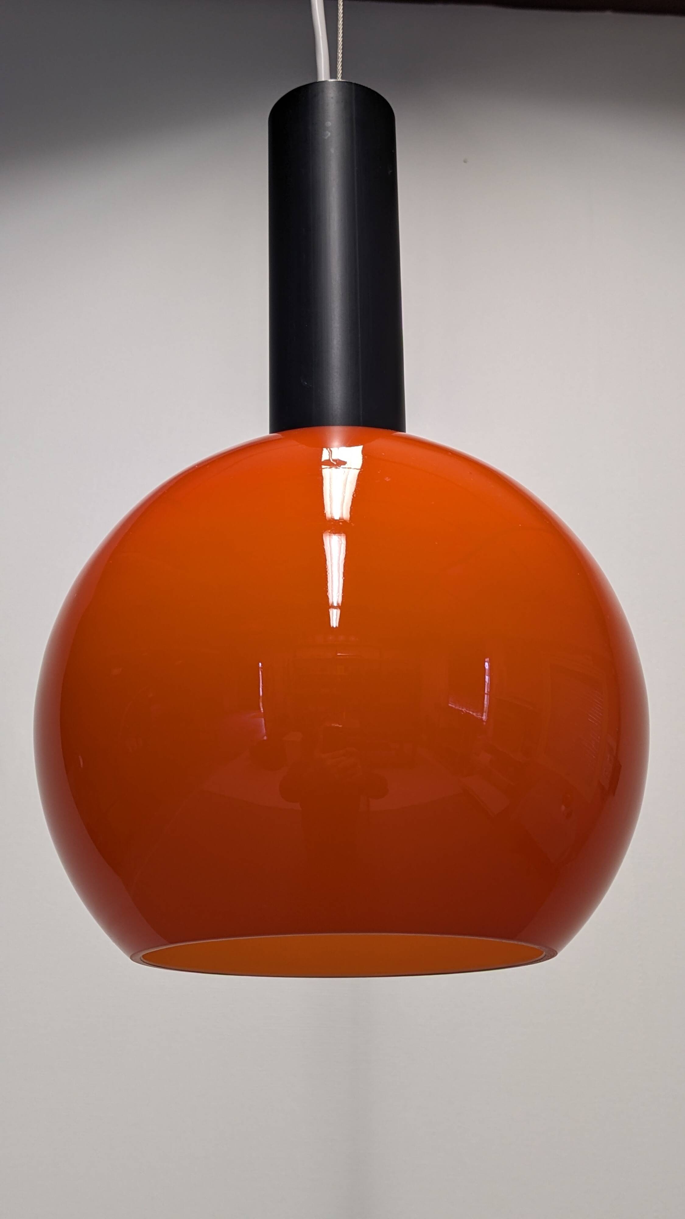 Orange opaline ball pendant by Parscot, France circa 1970.